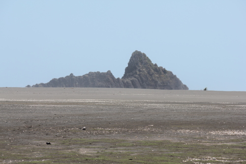 Paratahi Island across the hot sand