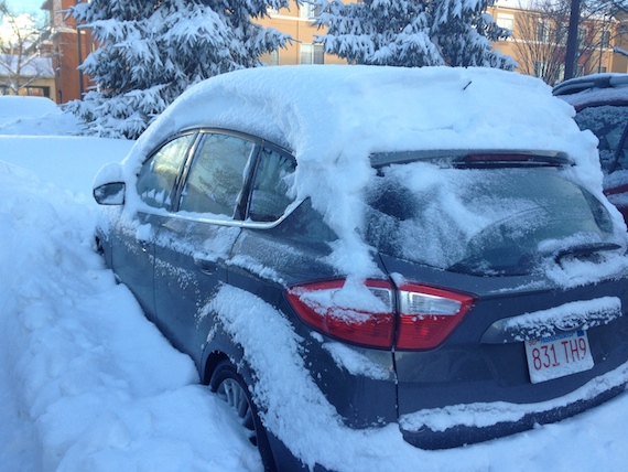 Rental Car covered in Snow