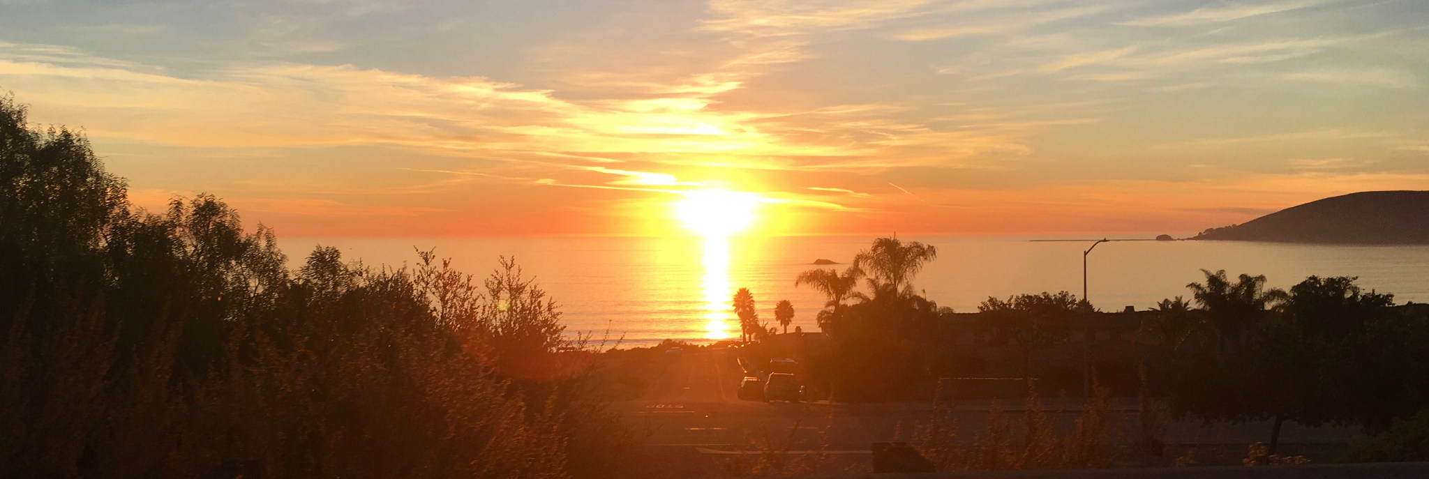 The sun setting over Pismo Beach