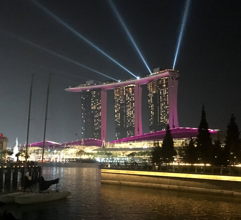 This is the famous and slightly sinister Marina Bay Sands Hotel and Casino, during a nighttime light show