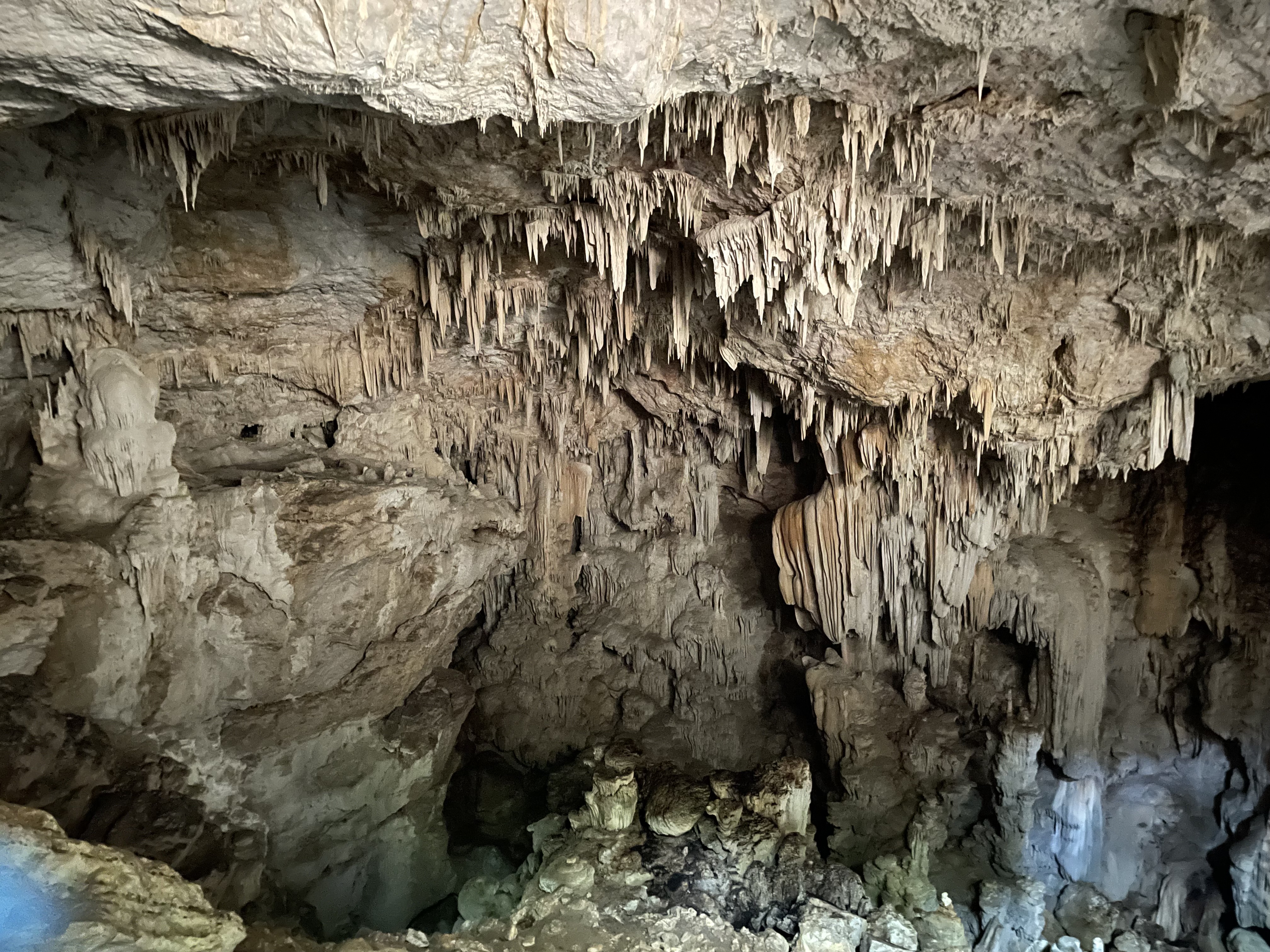 The entrance to the Crystal Cave is a steep climb (with a rope) down a rock slope